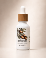 Bee Bella Argan Oil back label showing 100% Organic Argania Spinosa Kernel Oil ingredients with an argan branch illustration