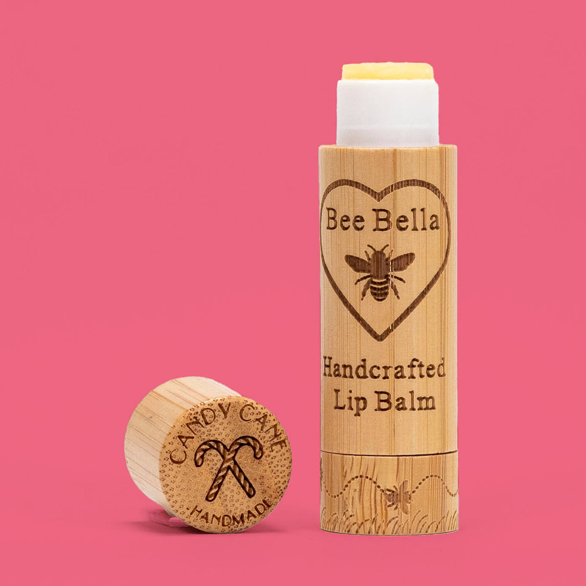Candy Cane natural beeswax lip balm on festive holiday color background