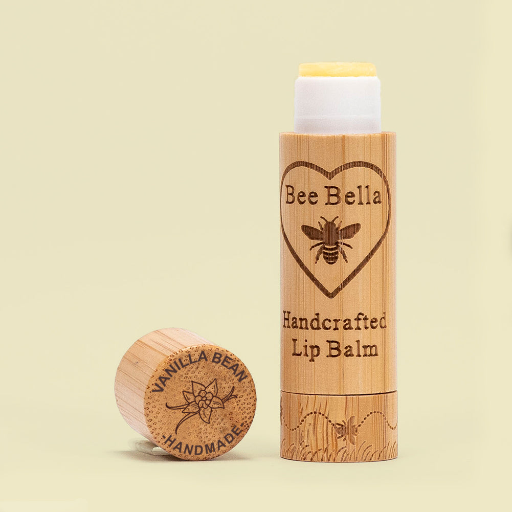 Vanilla Bean natural beeswax lip balm on warm cream color background