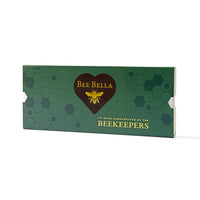 Five Bee Bella natural beeswax lip balms displayed on white background